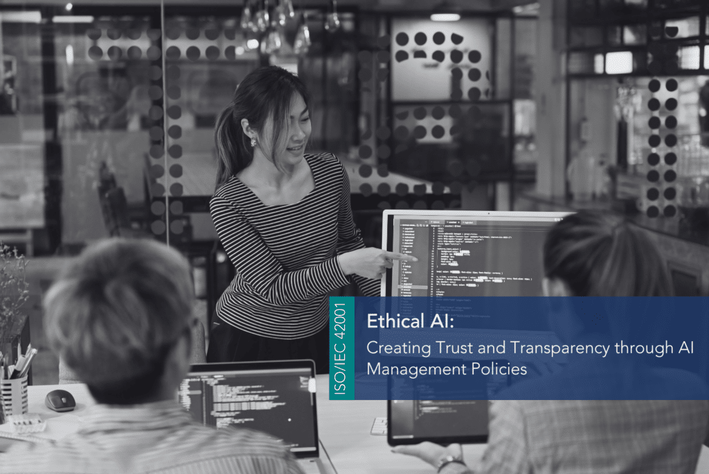 Ethical AI MAIN A person pointing at a computer